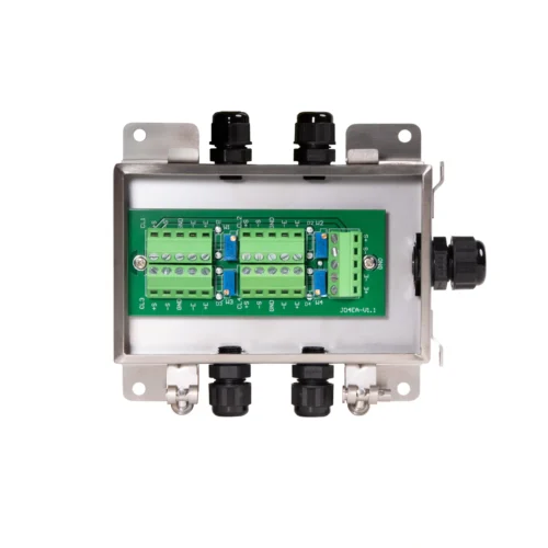 Load cell junction box with multiple cable connections for industrial weighing applications.