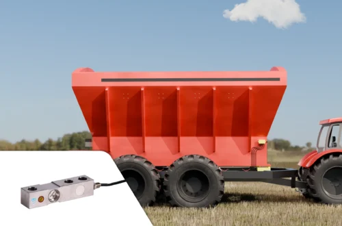 A fertilizer cart in a farm field using single ended beam load cells to measure hopper weight.