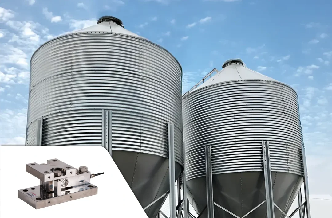 Two bulk feed silos that utilize weigh modules to manage feed rate.